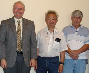 Gerald F. Dudding with inventors Jim Chang and Ken Monroe